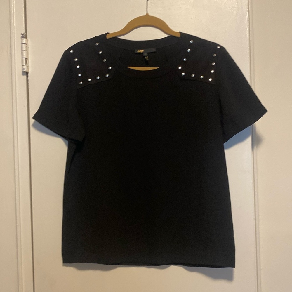 Maje black tee shirt with faux suede on shoulders and silver nailheads.